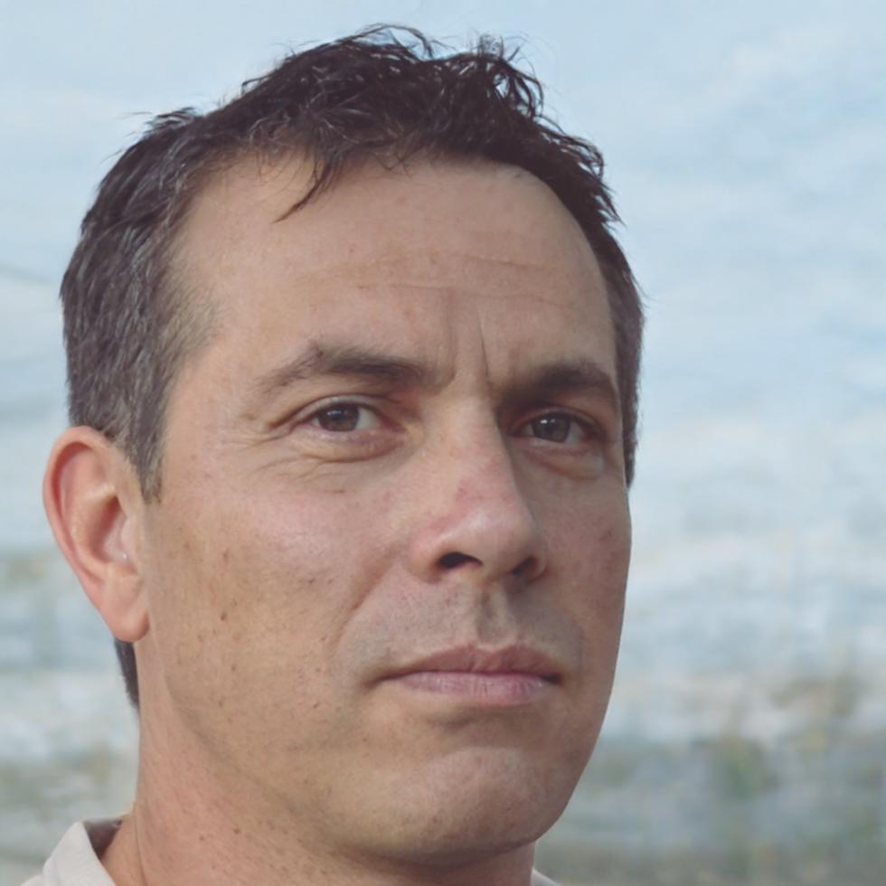 Pradeep Kumar, robotics program graduate, working at his engineering workstation